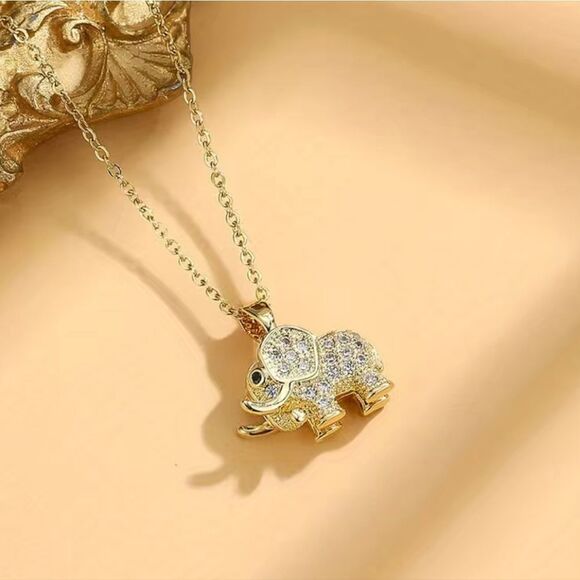 Stainless Steel Elephant Pendant Necklace in Gold Tones and embedded Zirconia - Picture 6 of 11